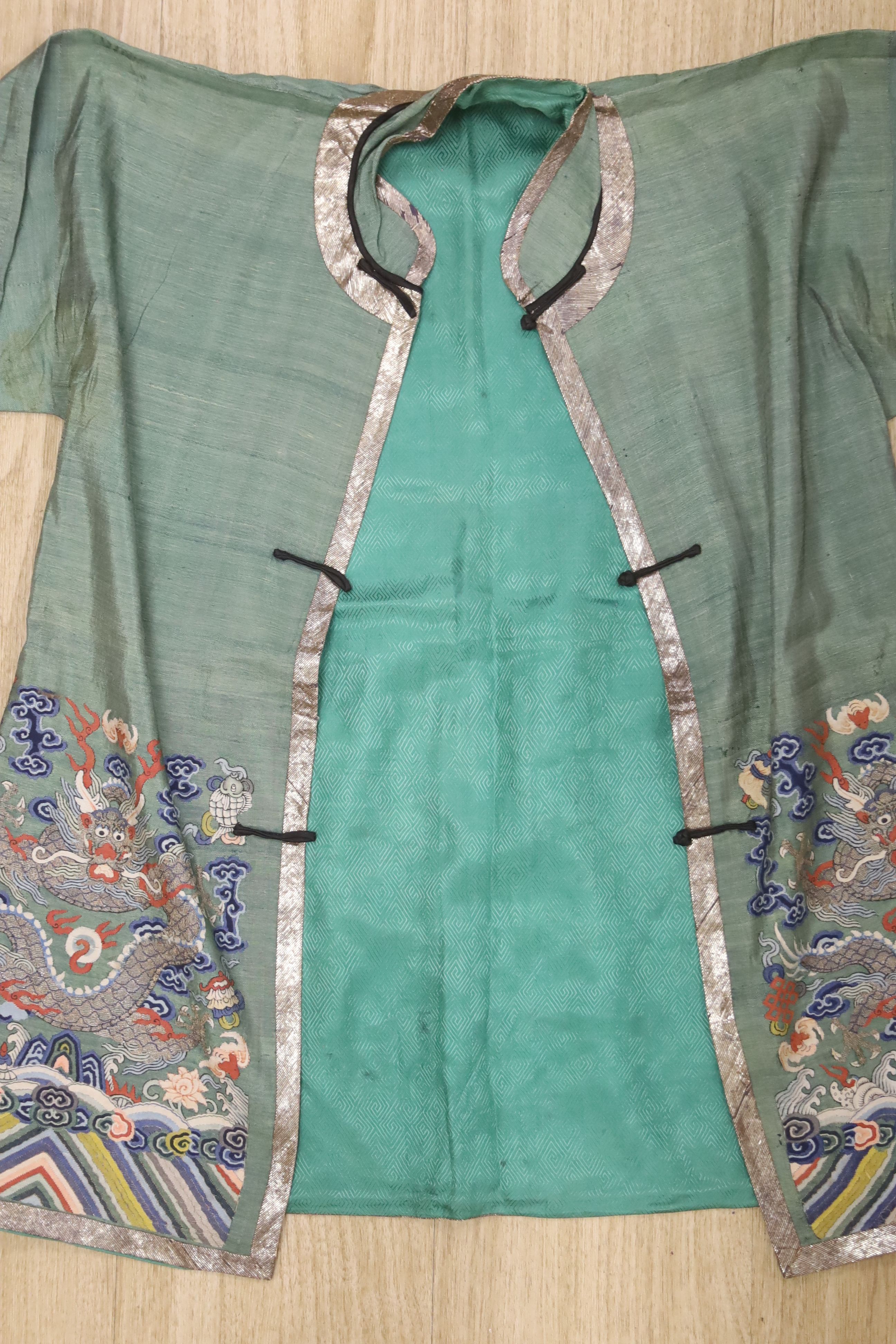 A Chinese Kesi ‘dragon’ jacket, late Qing dynasty, alterations and some wear